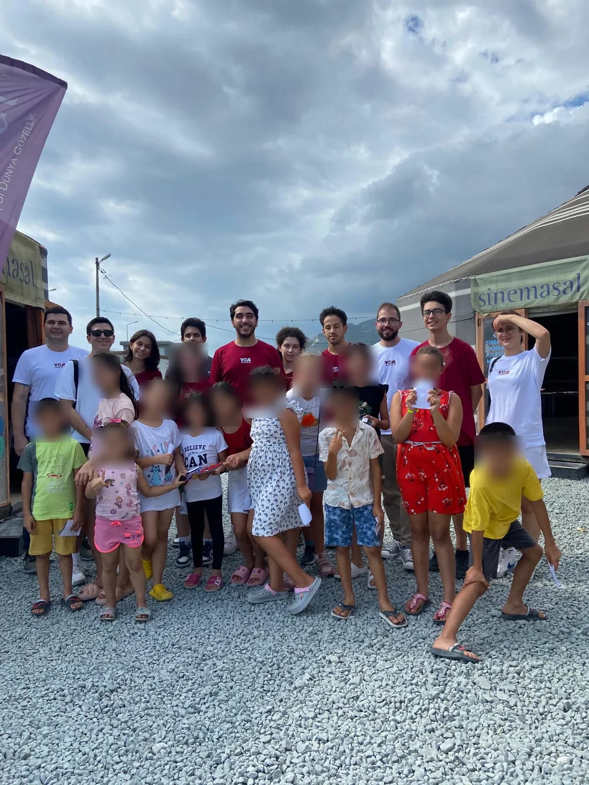 YGA volunteers with children in Samandağ, children's faces blurred